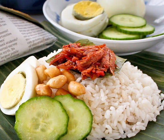 This is a malay cuisine which the coconut flavored rice with mix banana leaves together with cucumber and egg and fried ikan bilis.